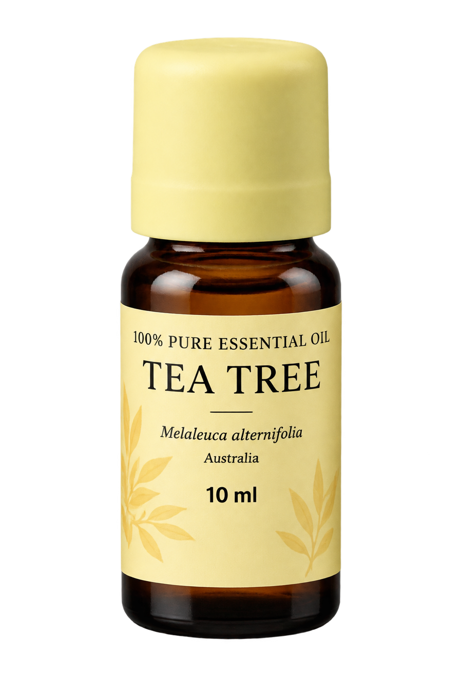 A 10 ml bottle of Tea Tree essential oil with an amber glass body, a pale yellow cap, and a matching pale yellow label featuring black text and leaf illustrations.